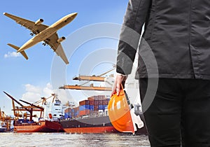 working man and commercial ship on port and air cargo plane flying above use for water and air transport,logistic import export i