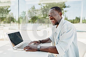 Working man male entrepreneur businessman african business person adult modern laptop young computer technology
