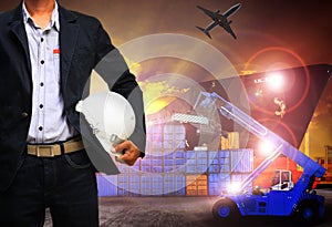 Working man in shipping port,freight cargo ,logistic and import,