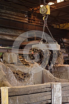 Working metal scrap loading machine in action