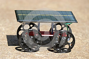 Working model of a solar car powered by photovoltaic cell that convert solar energy to electrical energy powering dc motor to run