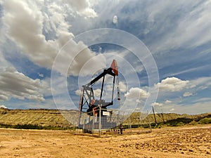 Working oil pumps silhouette in row photo