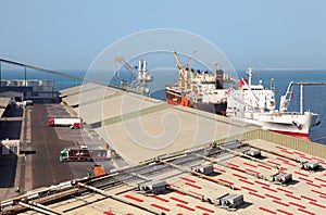 Working people ship cargo boats at port photo