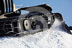 Working Piste machine (snow cat) detail