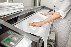 Working with professional ironing machine