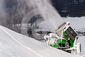 Working snow cannon at ski resort.