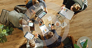 Working, team business meeting and graph logistics strategy of marketing teamwork in a office. Top view of staff