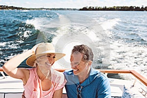 Working through their retirement bucket list. a mature couple enjoying a relaxing boat ride.