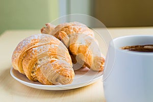 Working time, coffee break with some croissants