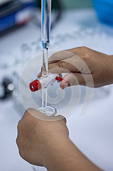 Working Titration technique in the laboratory.