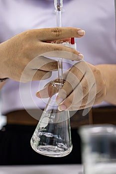 Working Titration technique in the laboratory.