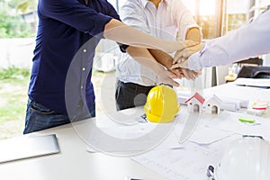 Working together teamwork. Group of engineers working together to plan the project at the meeting