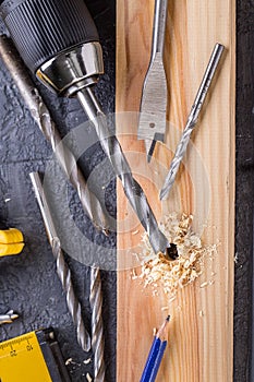 Working Tool on a Wooden Background. construction tools