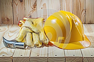 Working tools gloves helmet and claw hammer