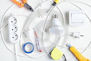 Working tools, light bulb and components. Electrical objects