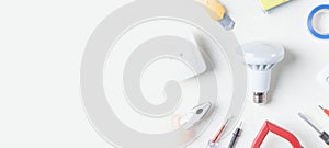 Working tools, light bulb and components. Electrical objects