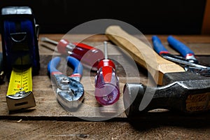 Working tools on wooden background