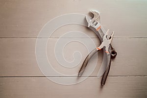 Working tools on wooden rustic background. top view.