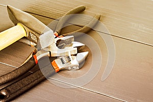 Working tools on wooden rustic background. top view.