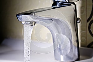 Working water tap close up shot