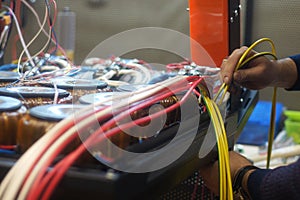 Working with wire spools for electricity equipment photo