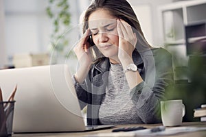 Working woman have a headache