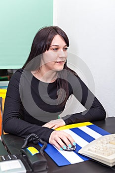 Working woman looking at the monitor screen