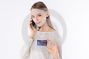 Working Woman with smart casual look presenting her credit card