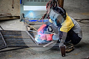 engineer braze iron body in the workshop photo