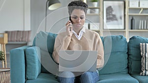 Working Young African Girl Talking on The phone