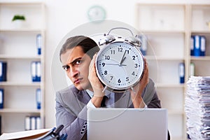 Workload male employee in time management concept