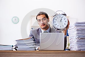 Workload male employee in time management concept
