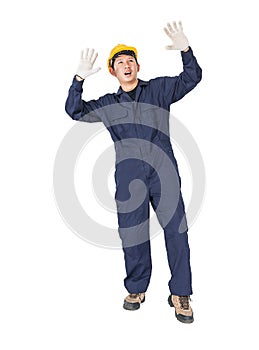 Workman with blue coveralls and hardhat in a uniform with clipping path