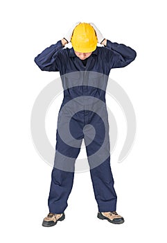 Workman with blue coveralls and hardhat in a uniform with clipping path