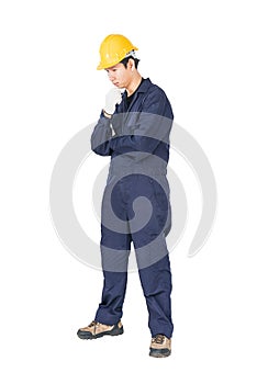 Workman with blue coveralls and hardhat in a uniform with clipping path