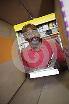 Workman Checking Inventory photo