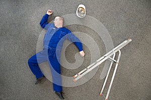 Workman fallen off ladder photo