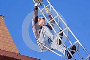 Workman installing HDTV digital antenna