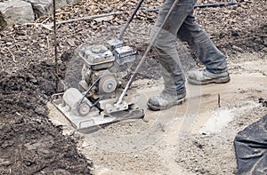 Workman Operating a Power Plate Compactor  1