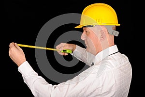 Workman with tape measure photo