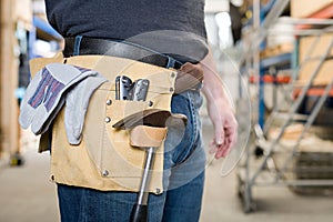 Workman with toolbelt