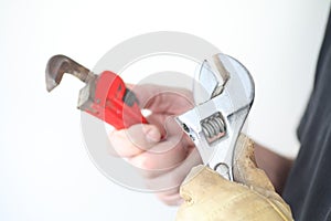 Workman with two wrenches