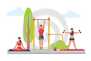 Workout area. Man pull-ups on horizontal bar. Girl jumping rope and does yoga.