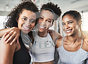 Workout buddies More like workout sisters. a group of happy young women enjoying their time together at the gym.