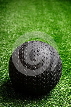 Workout exercise or fitness ball in gym on the grass