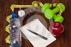 Workout and fitness dieting copy space diary. Healthy lifestyle concept.