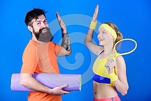 Workout and fitness. Sporty couple. Healthy lifestyle concept. Man and woman couple in love with yoga mat and sport