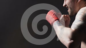 Workout, Muay Thai boxing set, masculine boxer preparing for fight in the gym