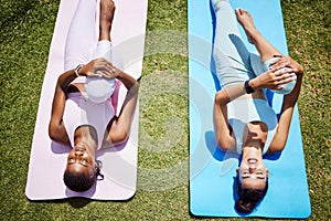 Workout, stretching and women on grass yoga for fitness, relax workout or zen exercise in nature. Friends, people or