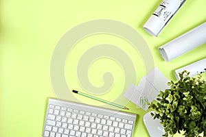 Workplace of architect - rolls and plans. Construction background.